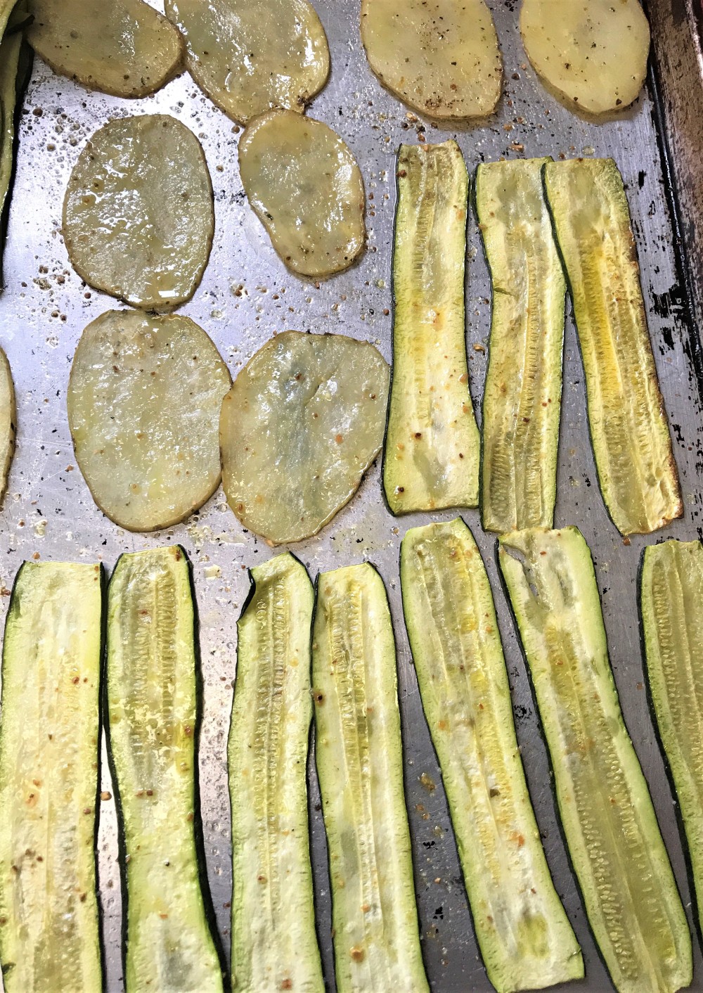 Baked potatoes and zucchini